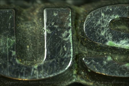 Macro US, Olympus Logo